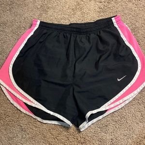 Nike dri-fit black athletic shorts with pink stripe